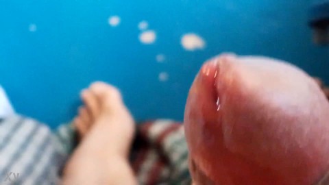 Precum, extreme closeup, jacking off my uncut cock. March 31, 2023.