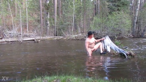 Naked bathing in the river.