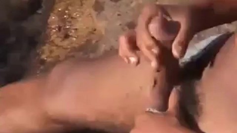 Arab Twink Strokes His Big Dick Outdoors by the Beach