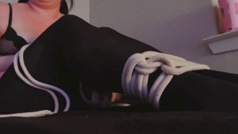 Tying myself up in stockings before my boyfriend for BDSM fun