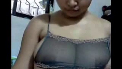 Indian Amateur Exposes Her Large Breasts on Webcam